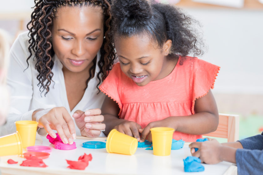 teacher and student playing.